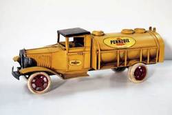 Yellow Pennzoil fuel delivery tank truck